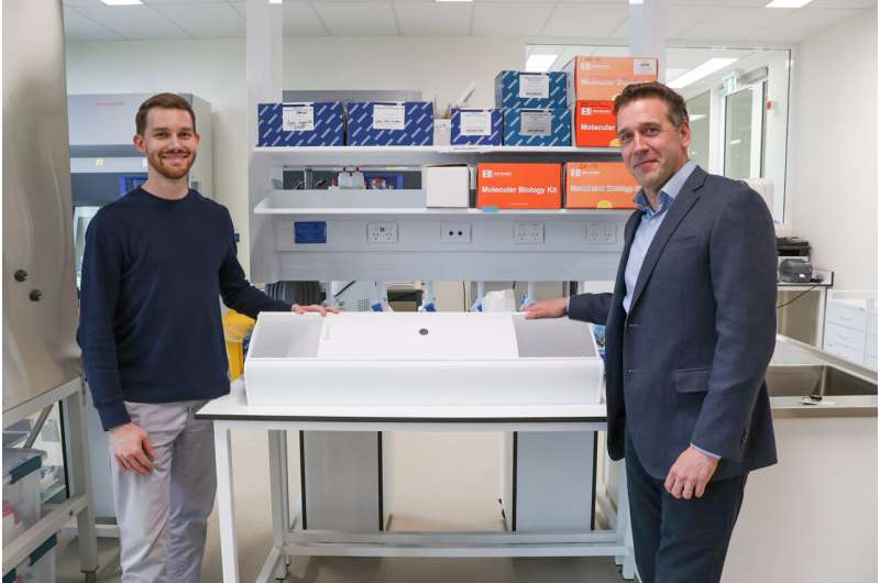 Authors Dr. Andrew Shoubridge and Professor Geraint Rogers with a GUV appliance. Credit: Flinders University Spotlight on technology to protect older Australians from respiratory infections